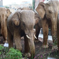 Statues of wooden elephants in Meatpacking District