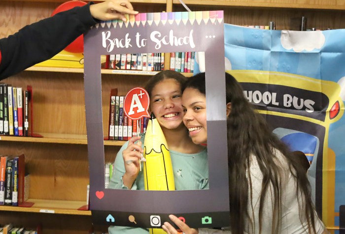 Parents were able to participate in fun activities at the giveaway, including photo ops.