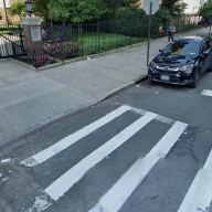 Bronx street lined with cars