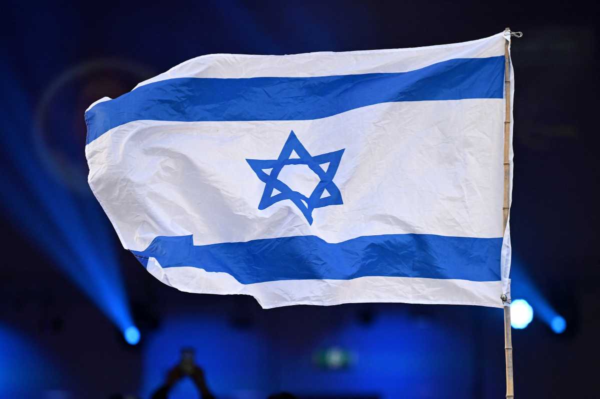 The flag of Israel is seen during a Jewish community vigil marking the first anniversary of Hamas' October 7 attack on Israel in Moorabbin, Melbourne, Australia, October 7, 2024. AAP/James Ross via REUTERS