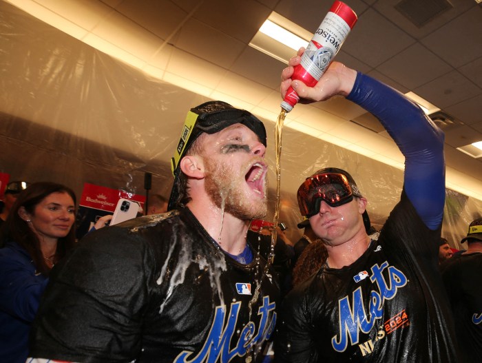 2024 Mets break 24-year drought, clinch first playoff series in Queens since 2000 3 Pete Alonso Harrison Bader celebrate post-NLDS Mets