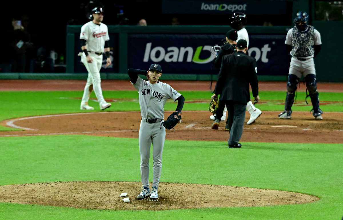 New York Yankees pitcher Luke Weaver (30) reacts after giving up a two-run home run during the ninth inning against the Cleveland Guardians in game 3 of the American League Championship Series at Progressive Field.