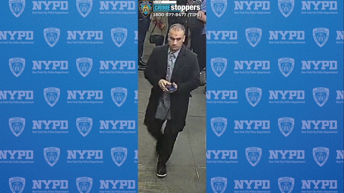 man in a long dark coat who allegedly abused a woman near Times Square