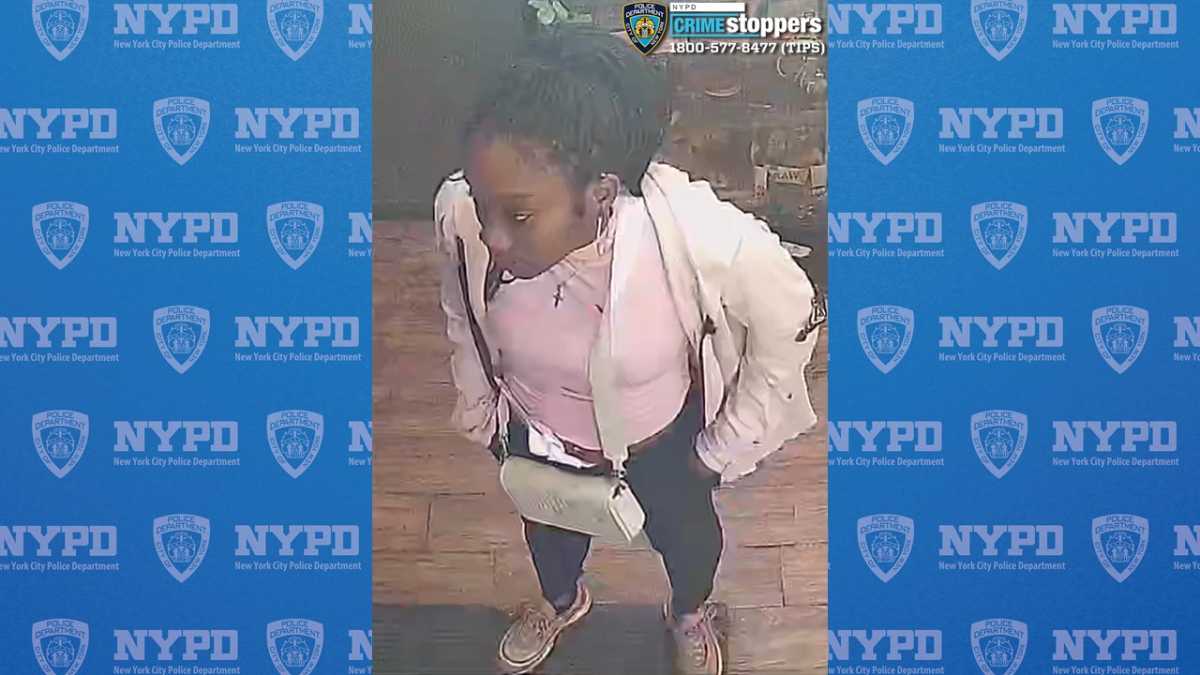 woman wearing white sweater wanted for random attack in Lower Manhattan