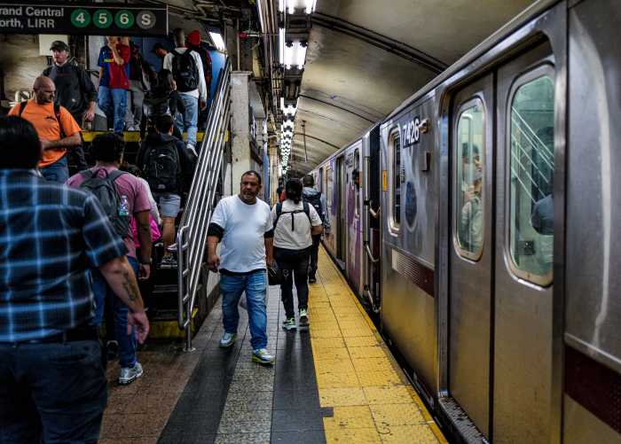 Riders at the Grand Central station on the 7 train in Manhattan on Oct. 22, 2024.