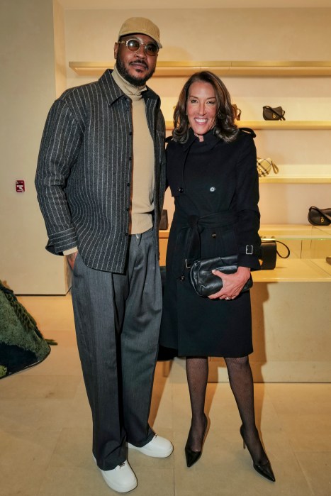 Cher, Tyra Banks and other stars celebrate Burberry's reopened flagship store in Midtown 3 Carmelo Anthony and Laura Dubin-Wander Burberry in Midtown