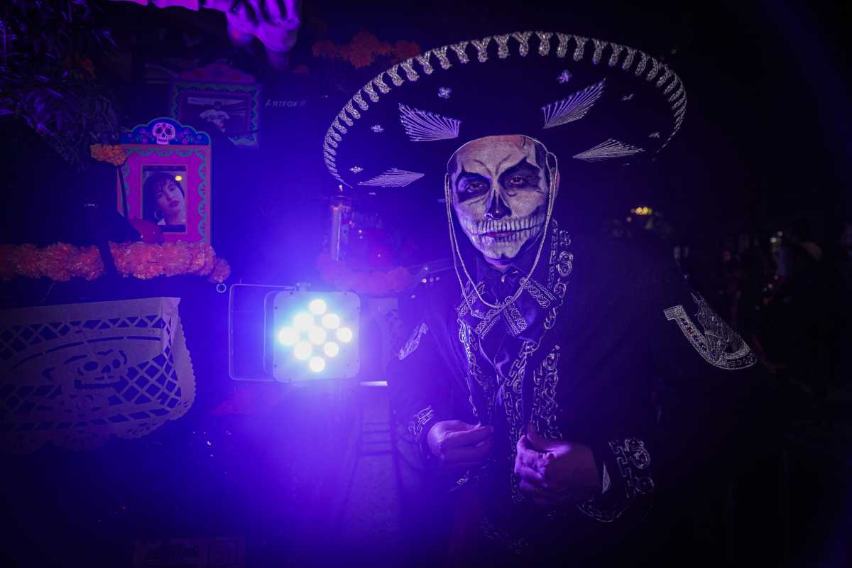 a man in costume at the Village halloween parade