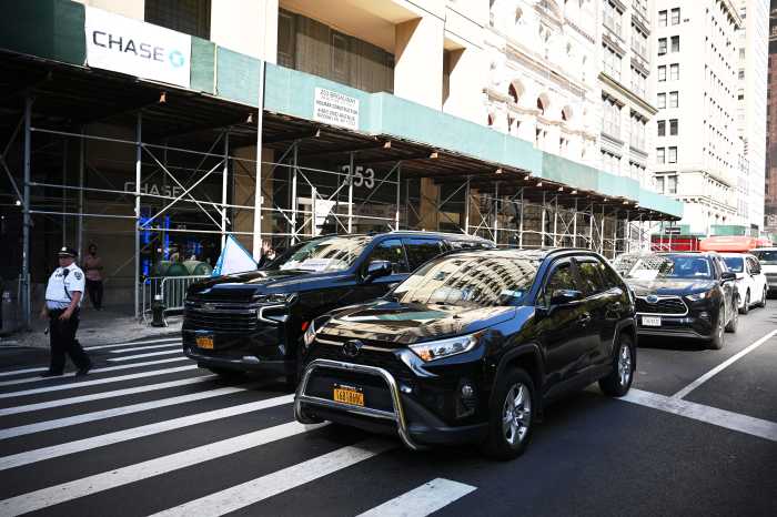 Uber and Lyft drivers in Lower Manhattan.