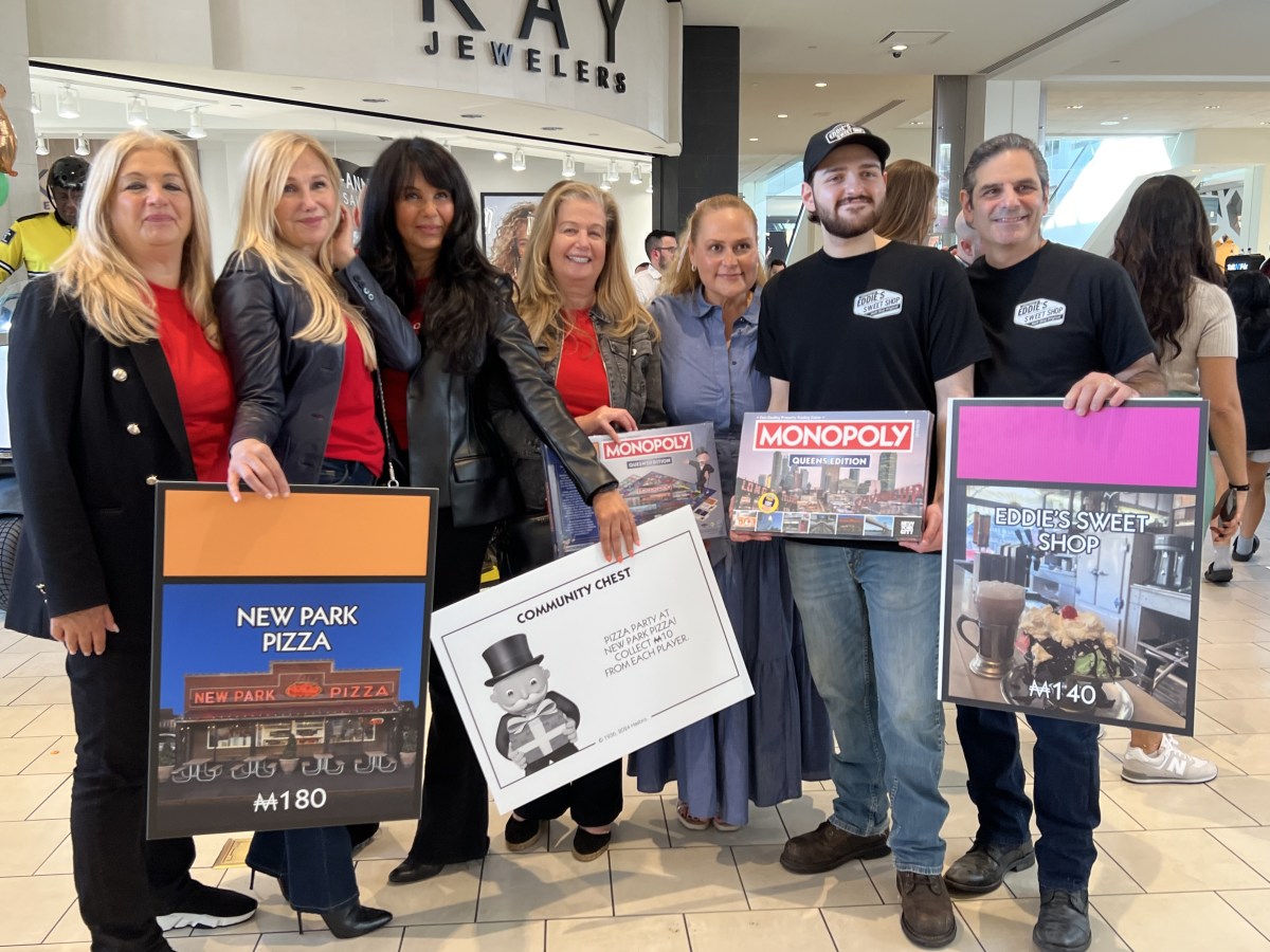 Queens Center Mall hosts Monopoly Queens edition board reveal 3 Queens Monopoly features actual Queens businesses as game spaces.