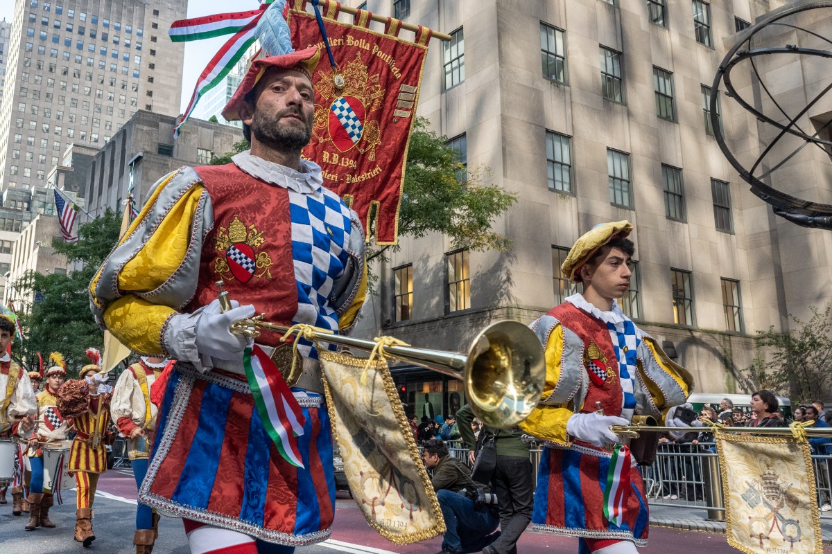 men dressed as royal court members