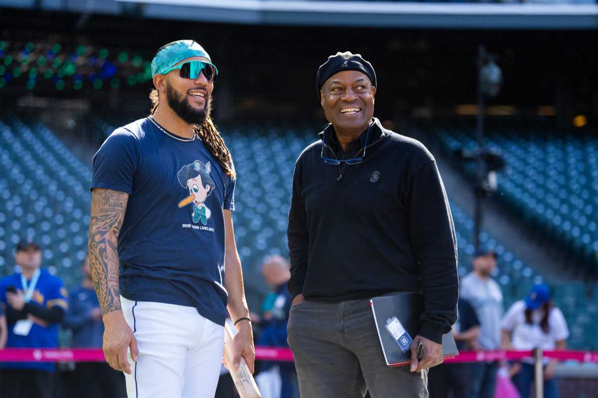 Dave Sims, shown wiht Seattle Mariners player J.P. Crawford #3, at T-Mobile Park on May 31, 2024 in Seattle.