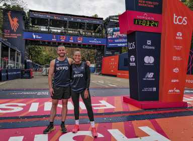 Police Officer Tim Miley (left) and Sergeant Katherine Guerrero prepare for the New York City Marathon.