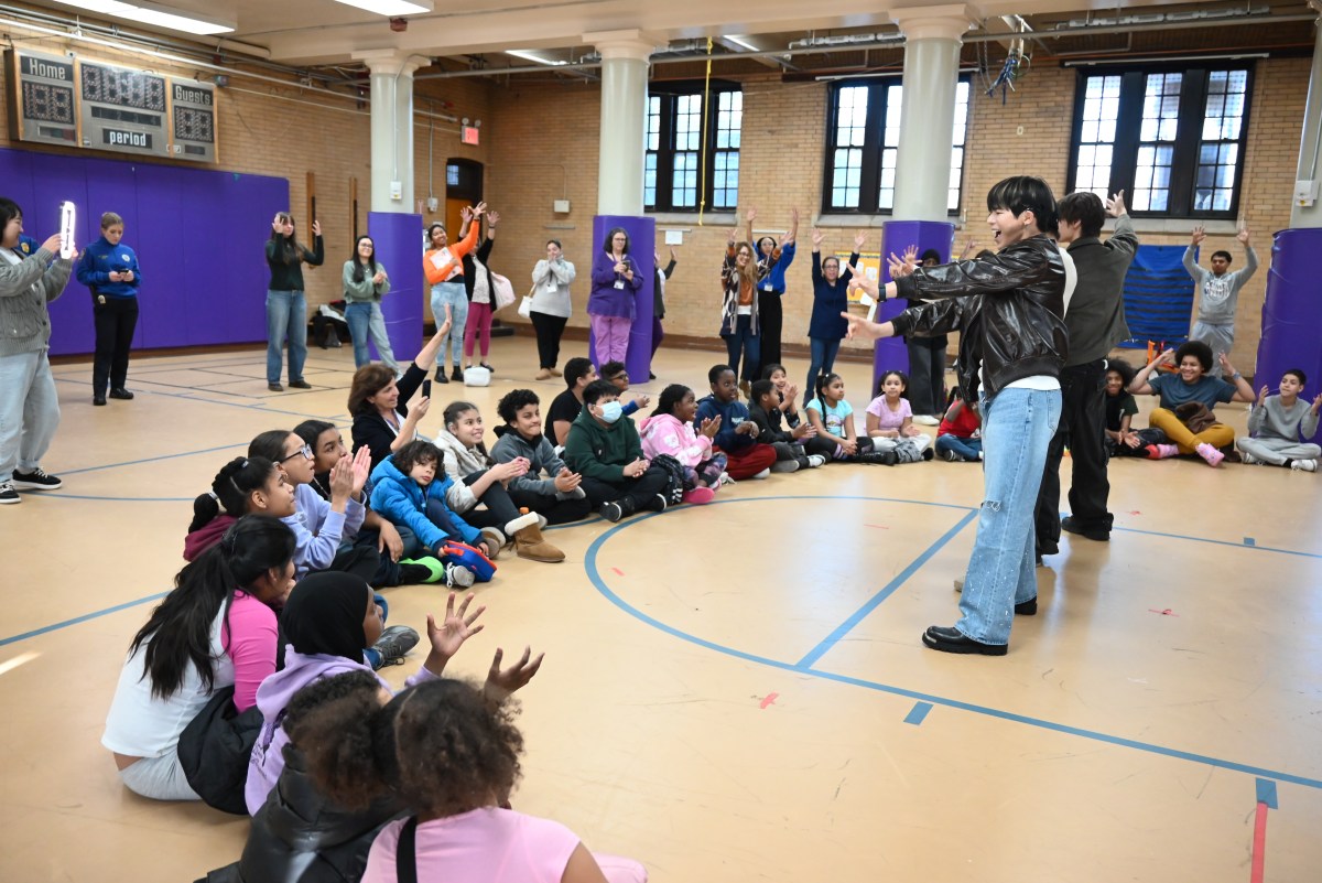 NYPD teams up with Big Ocean, K-Pop first hard-of-hearing act for surprise visit to Bronx school for deaf children 5 Big Ocean performing for the kids.