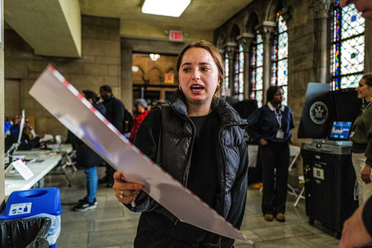 NYC voter with ballot