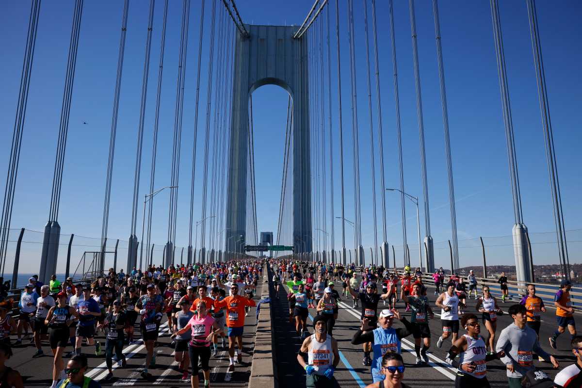 runners in NYC Marathon pass along the Verrazzano Narrows Bridge