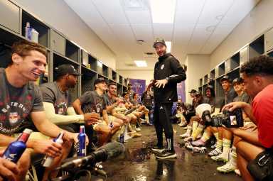 Red Bulls head coach Sandro Schwarz talks with the team after winning the 2024 MLS Cup Eastern Conference Final match at Inter&Co Stadium.