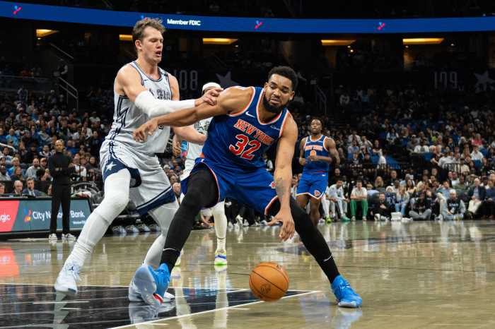 New York Knicks center Karl-Anthony Towns (32) dribbles the ball against Orlando Magic forward Moritz Wagner (21) in the second quarter at Kia Center.