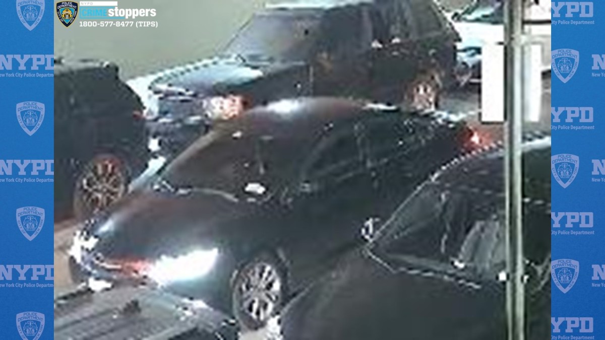 The getaway car shown in surveillance footage after a fatal shooting in Brooklyn.