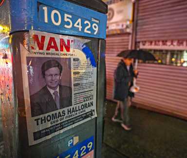 CEO wanted poster in Manhattan following Midtown assassin
