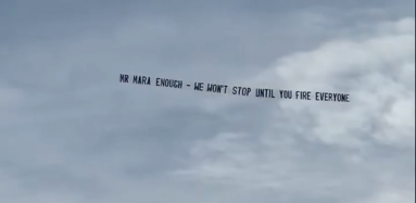 A banner that flew over MetLife Stadium on Friday.