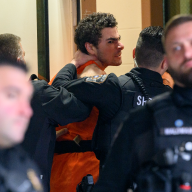 MIDTOWN ASSASSIN: Suspect Luigi Mangione fights extradition back to New York, yells while taken into courthouse 5 Alleged Midtown assassin Luigi Mangione at extradition hearing