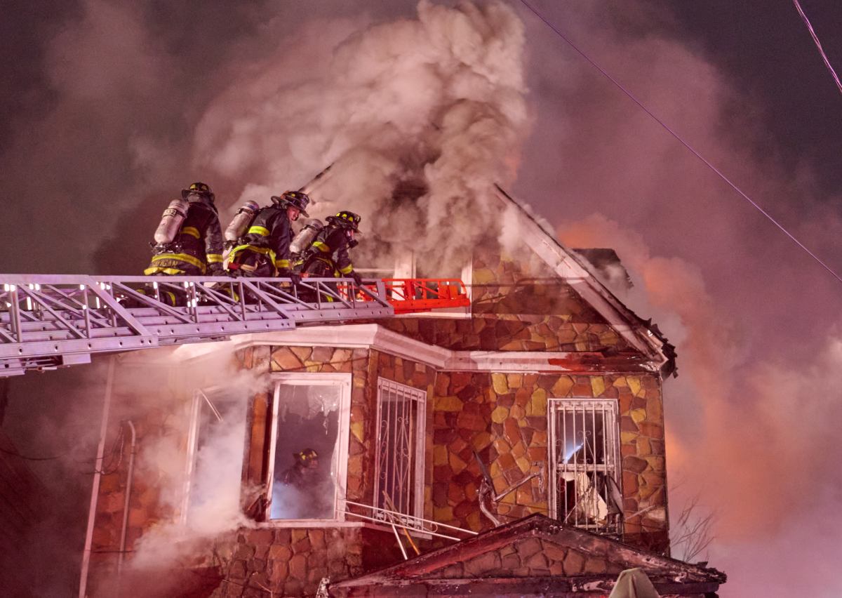 Firefighters in Brooklyn battled a three-alarm fire through freezing temperatures on Monday morning, Jan. 6, 2025, leaving two residents injured.