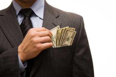 A man with money in his pocket.