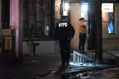 Police at stabbing scene in Queens