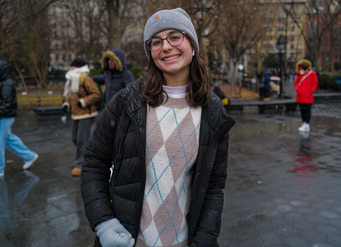 NYC influencers glad to have TikTok back after ban lifted — but wonder about the future 2 a woman standing outside in NYC where she discussed a possible TikTok ban