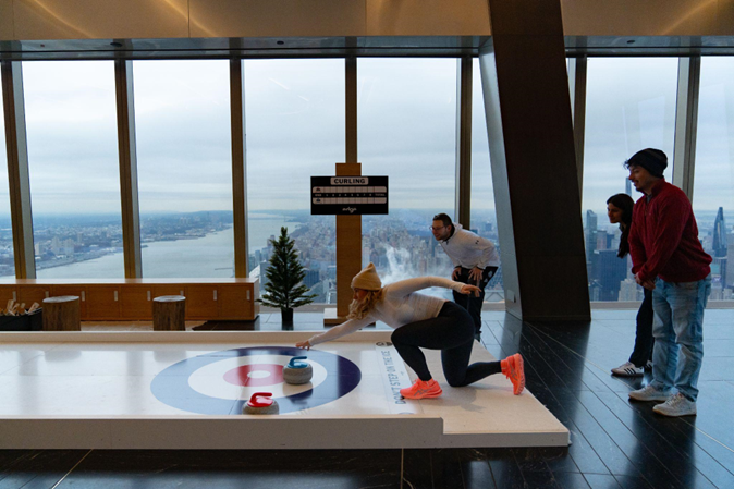 The Sky Chalet is a new curling experience at Edge at Hudson Yards.