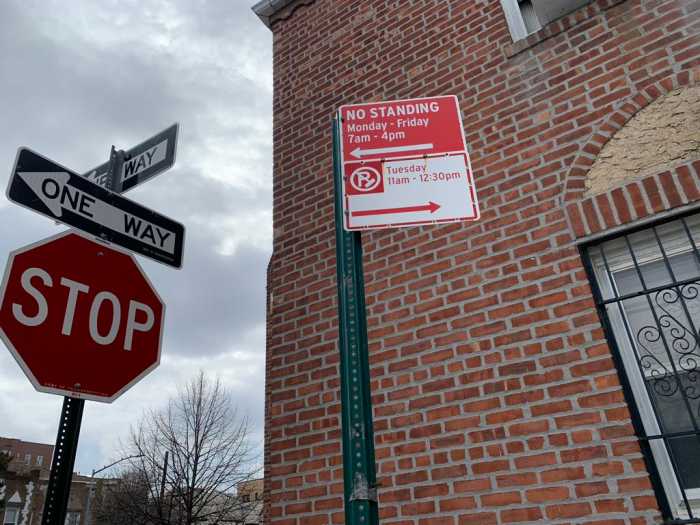 DOT sign at an intersection in Queens