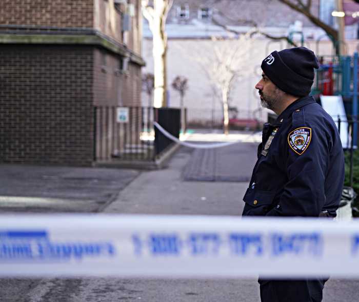 A police officer at a crime scene in Bronx.