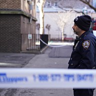 Bloodshed in the Bronx: Two women stabbed, male suspect at large in deadly domestic dispute 16 A police officer at a crime scene in Bronx.