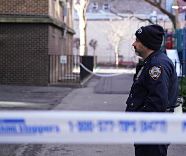 A police officer at a crime scene in Brooklyn.