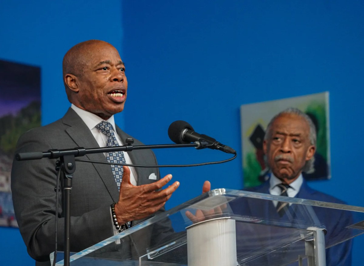 Mayor Eric Adams (left) and Rev. Al Sharpton (right).