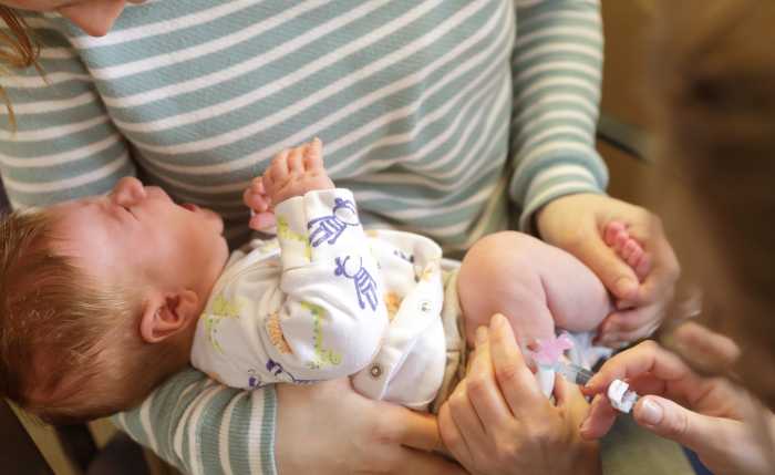 Measles advisory: New York state warns about dangers of infectious virus amid outbreak in Western U.S. 4 Young baby crying while getting vaccinated against measles