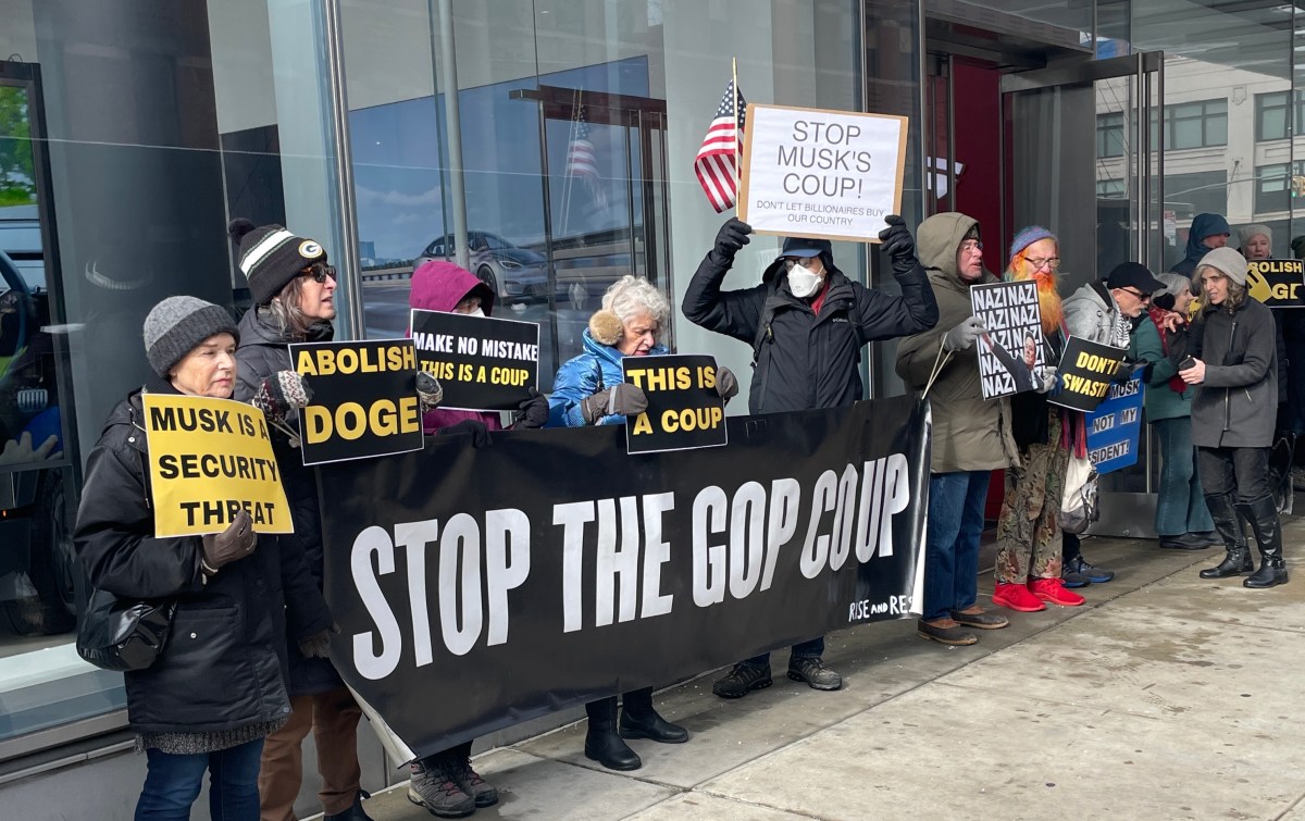 Protesting Elon Musk outside Manhattan Tesla showroom