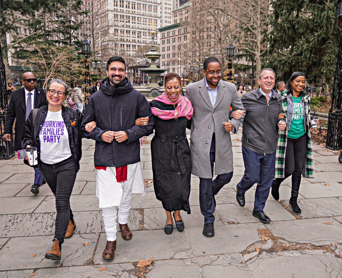 Working Families candidates for NYC Mayor's Race walk arm-in-arm
