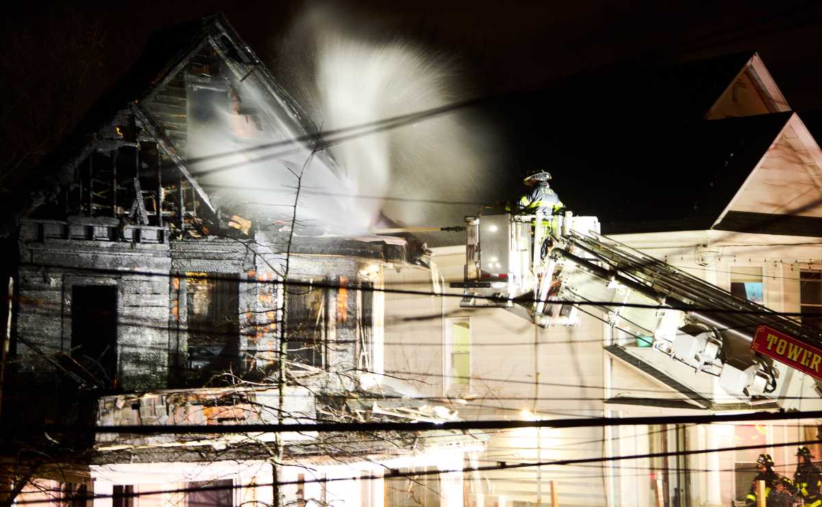 Staten Island firefighter pours water on fire