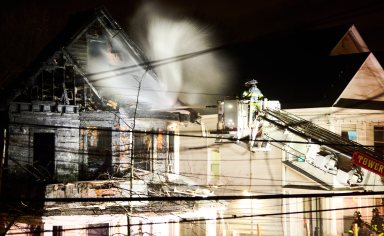 Staten Island firefighter pours water on fire