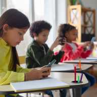 Cellphone ban will start at NYC Public Schools in September; here's what to know 5 Students on cell phones in schools