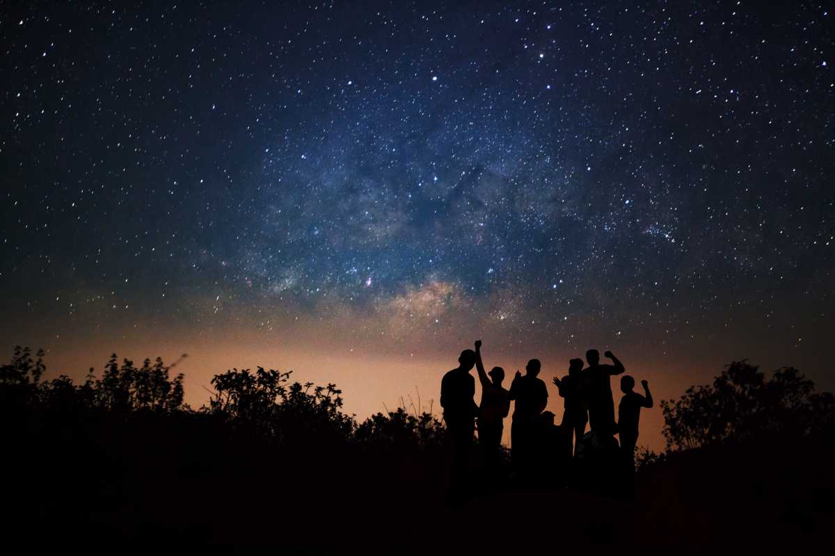 Silhouette People Against Sky At Night