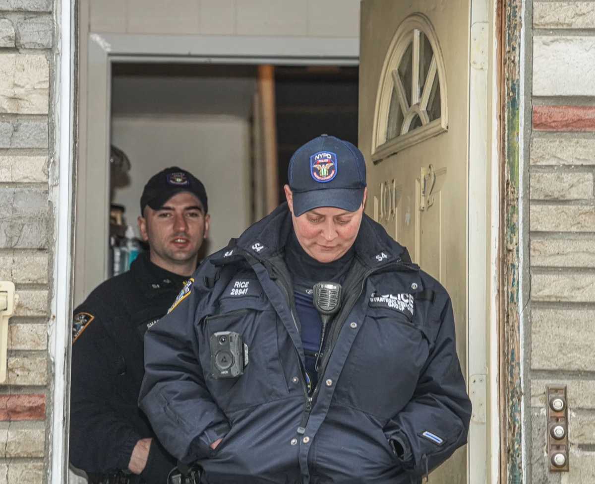 Officers at scene in Queens where Win Rozario was shot dead