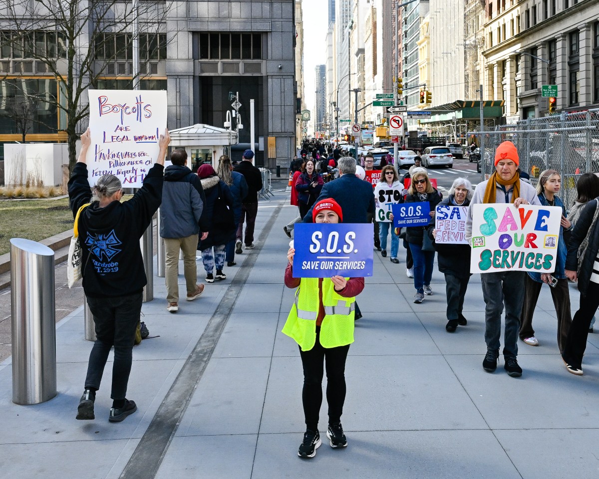 Federal workers and allies protested outside the Jacob K. Javits Federal Building against the massive DOGE firings. Photo by Gabriele Holtermann