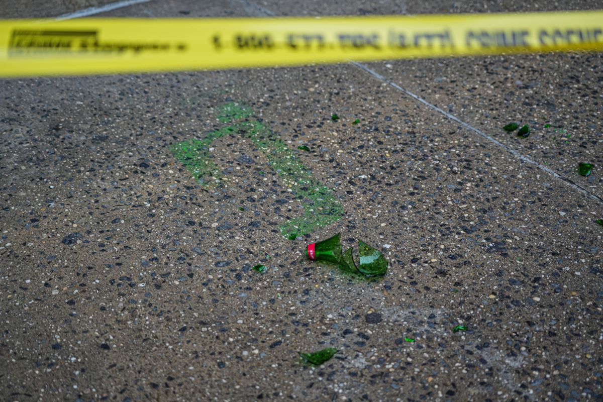 Glass on the ground after SoHo stabbing
