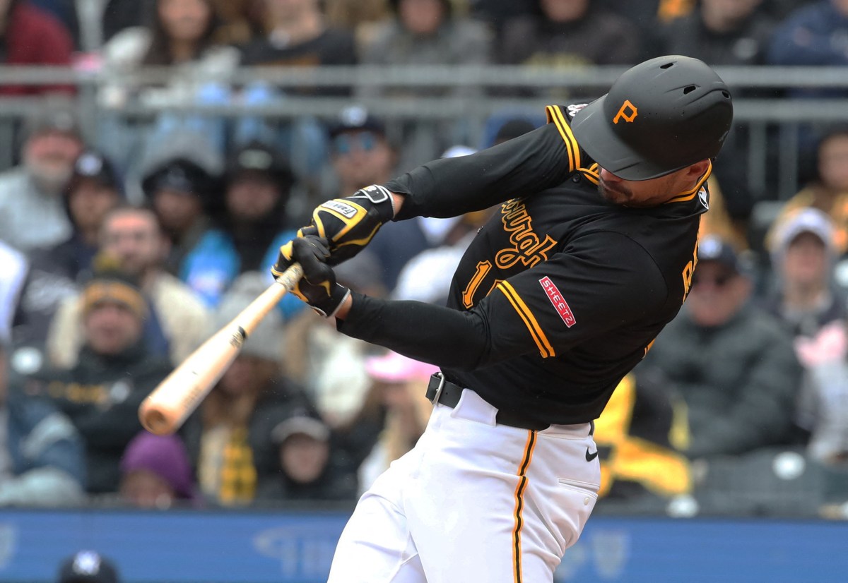 Pirates player swinging bat against Yankees