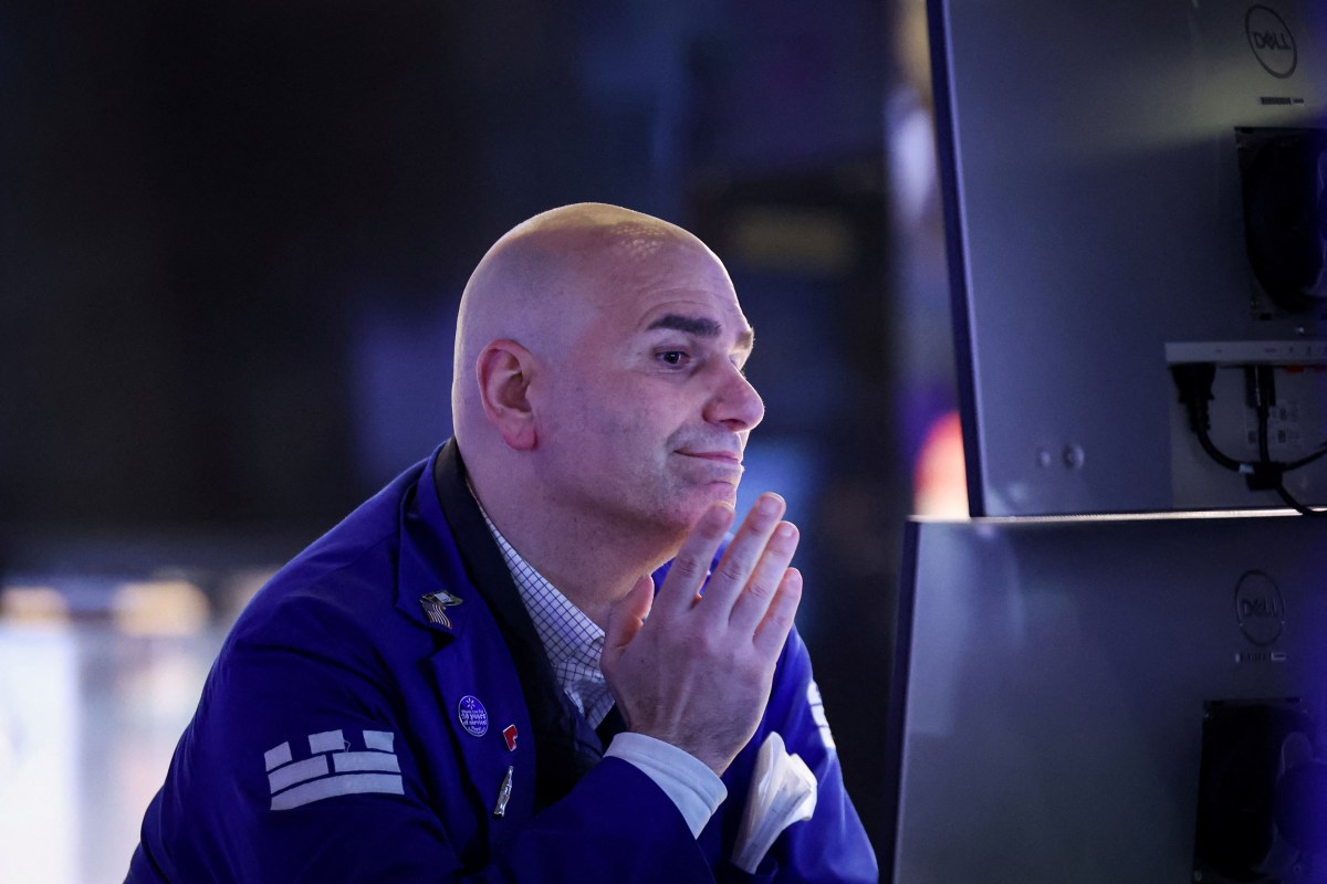 Manhattan stock broker pensive during trading amid Trump tariffs