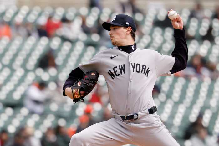Yankees pitcher Max Fried throwing ball