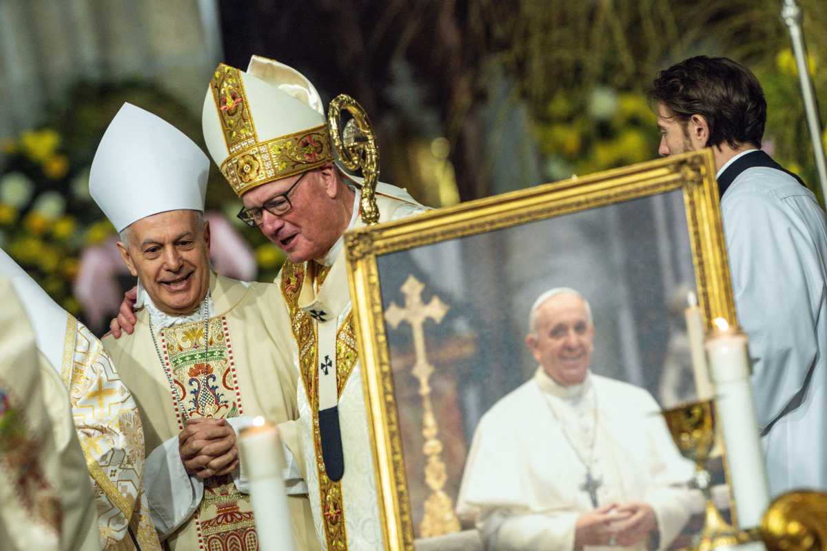 Cardinal Dolan with another priest at Pope Francis memorial mass at St. Patrick's Cathedral