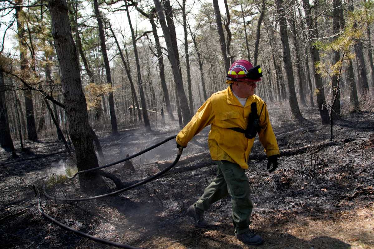 Firefighter battles New Jersey wildfire amid air quality alert